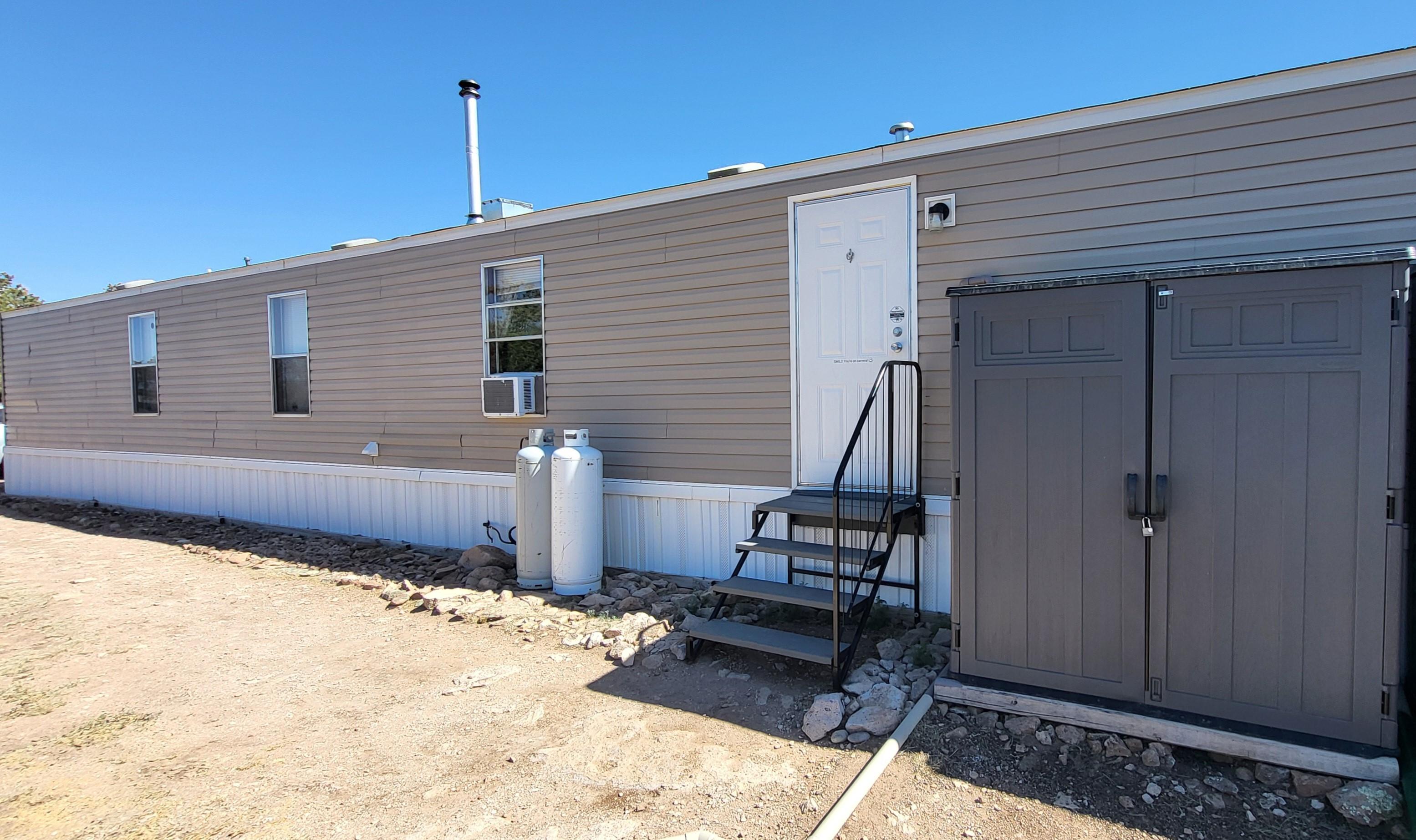 Back of home & Solar Building