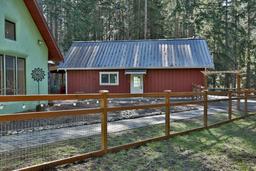 Detached 2 car garage with 400sf shop, .5 bath, & Laundry.