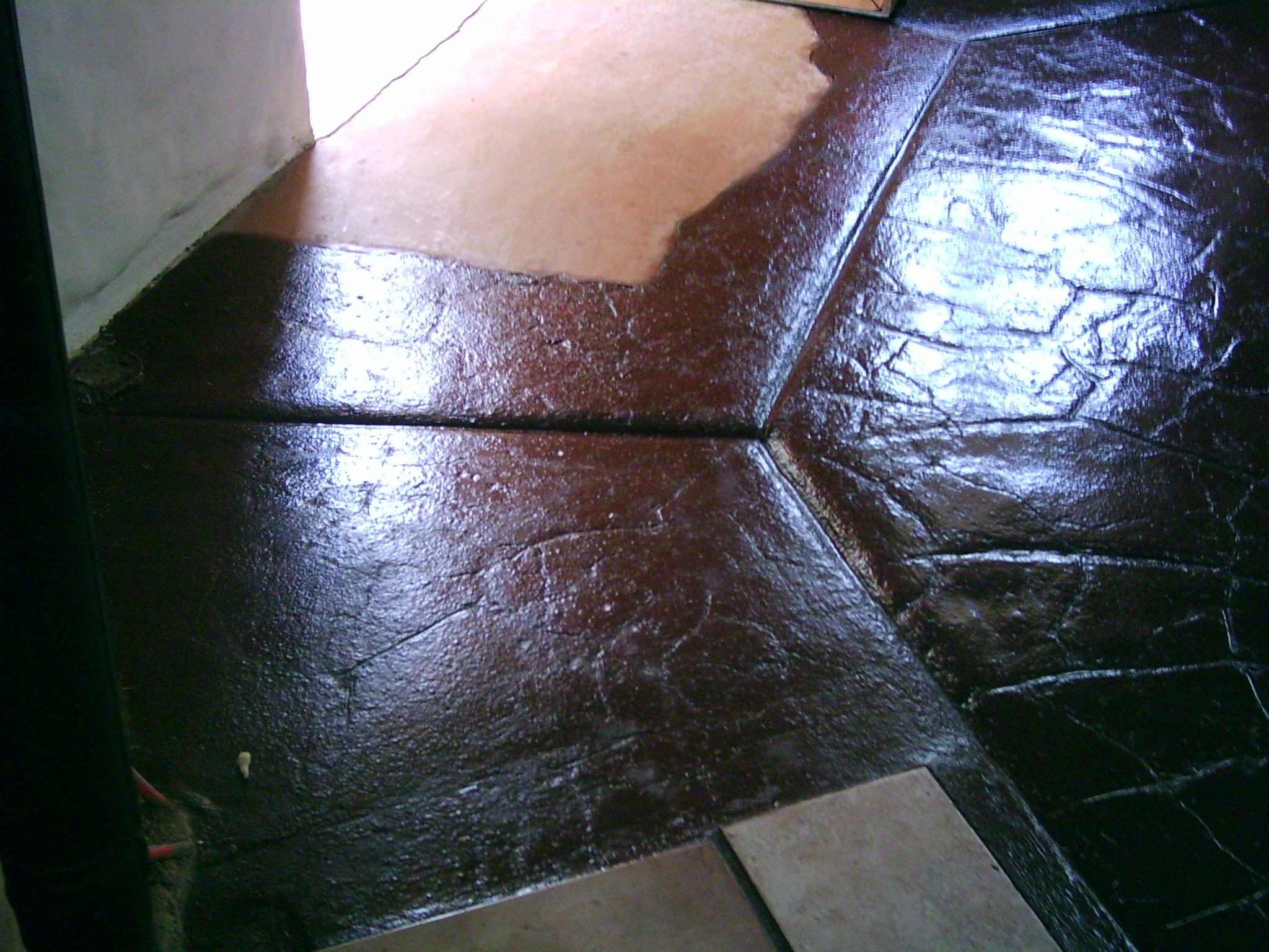 Earth (Adobe) Floor 6" to 8" deep. It absorbs heat during the day and radiates it back at night.